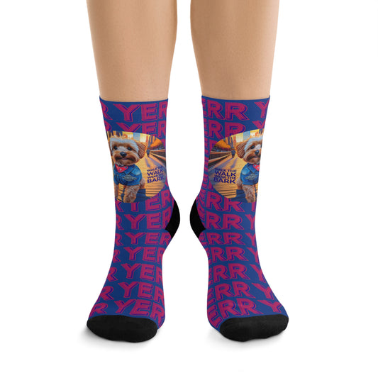 “BARKER by M.B. Salas Lyon-Sully socks with vibrant all-over print, made from recycled materials, displayed on a white background.”